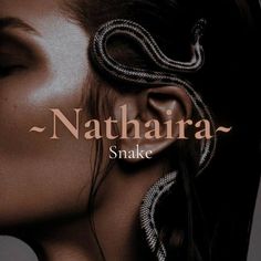 a woman with snakes on her ear and the words nattharia snake in front of her face