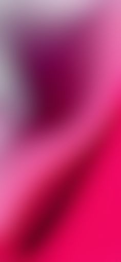 a blurry image of pink and white colors