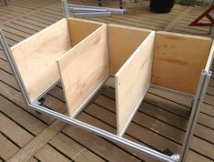 a group of wooden boxes sitting on top of a wooden floor