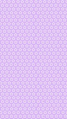 a purple background with white flowers on it