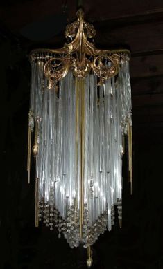 a chandelier hanging from the ceiling in a room