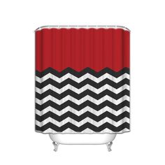 a shower curtain with black and white chevrons on the bottom, red background