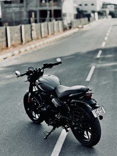 a motorcycle is parked on the side of the road