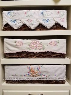 the linens are lined up on the shelves in the closet for storage and display