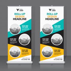 two roll up banners with cityscape on the back and yellow, black and blue colors