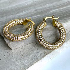 New ~ Anthropologie Shashi Gold "Dominuque" Pave Hoop Earrings These Medium Sized Hoops Are Completely Encrusted With Cubic Zirconia Pave Crystals. Every Part Of These Hoop Earrings Shine. Excellent Quality And Sure To Take Your Look To The Next Level! Pair These Detailed Crystal Earrings With Any Outfit To Add A Hint Of Sparkle! Approx.1-1/8"L, 1"W. 14ct Gold Plated Brass, Aaaa Cubic Zirconia. Hinged Closure. Nwot Anthro, Boho, Free People, Bridesmaid, Rhinestone, Sexy, New Anthropologie, Shash Jewelry Preppy, Pave Hoop Earrings, Boho Free People, Diamond Stacking Rings, Anthropologie Jewelry, Hand Model, Stacked Jewelry, Silver Accessories, Gold Accessories