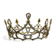 This crown positively architectural in its intricate structure. A Gothic presence to instill love and fear all at once ... but tiny. Rule the underworld in this tiara! Hell, raise tiny skyscrapers in the underworld! You are now one with the crown. Crown comes with a velvety soft storage bag Metal alloy. Mini crown measures 4.2" diameter  please note mini size! This can be propped on the head with hairpins or is about the size to go over a hair bun. Also makes a cute decoration. By Paper & Quartz Medieval Crowns, Love And Fear, Medieval Crown, Gothic Crown, Mini Crown, Crown Tiara, The Underworld, Sparkly Things, Hair Bun