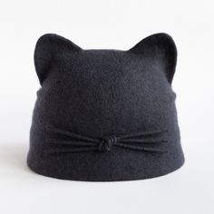 Merino wool hat with small visor an indispensable accessory in the cold season. Felted hat is warm, cozy and soft, it does not irritate your skin. Hat with cat ears great gift for cat lovers women. This item made to order and ready to ship in 3-5 business days after payments. Please choose size and color. ON THE PICTURE: size S, color wool-graphite (ready to ship). The circumference of your head approximately 22 inches (56 cm), length approx 7.7 inches (19,5 cm). MATERIALS: The cat ears hat is m Adjustable Warm Hat With Cat Ears, Adjustable Cat Ears Winter Hat, Casual Cat Ears Winter Hats, Gray Fitted Felt Hat For Winter, Gray Felt Hat For Winter, Adjustable Gray Felt Winter Hat, Gray Winter Cloche Hat With Curved Brim, Fitted Winter Hat With Cat Ears, Winter Wool Mini Hats