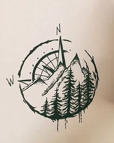 a drawing of a compass with trees on it