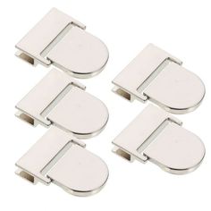 four white metal clips on a white background