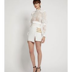 Zhivago Stretch Jersey Wrap Style Mini Skirt With Stitched Satin Waistband And Chain Feature On Hip. Nwt Size 4/Small Elegant Mini Skirt For Cocktail Occasions, Elegant Mini Length Bottoms For Cocktail, Luxury White Skirt For Spring, Elegant Mini Bottoms For Cocktail, Elegant Cocktail Mini Bottoms, Luxury Mini Skirt For Summer, Elegant White Mini Skirt For Evening, Luxury White Evening Skirt, White Asymmetrical Mini Skirt For Party