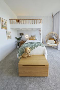 a bedroom with a bunk bed and hanging chair