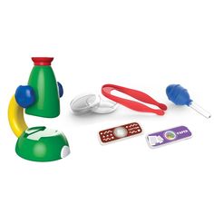 an assortment of toys including toothbrushes and hairdryer on a white background