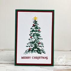 a card with a christmas tree on it