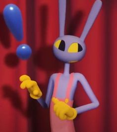 a cartoon character is juggling blue balls in front of a red curtain and drapes