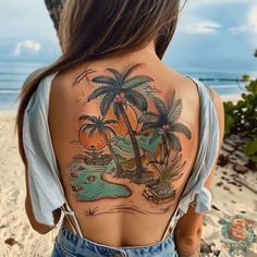 the back of a woman's shoulder with a palm tree and beach scene on it