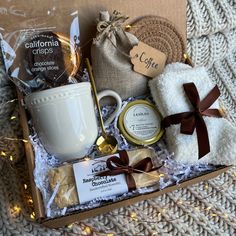 a gift box containing coffee, cookies and other items