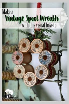 a wreath made out of old spools hanging from a chain with text overlay