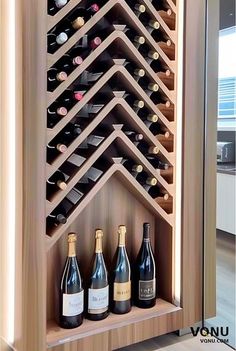 a wine rack with several bottles in it