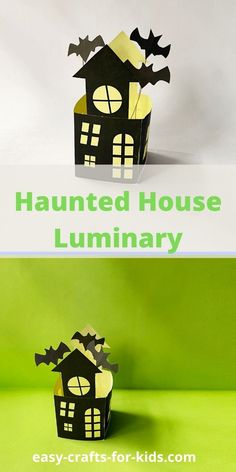 a paper house with bats on it and the words, halloween house luminary