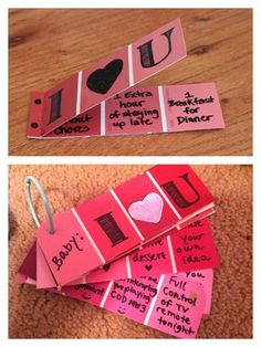 some pink and red paper tags with writing on them