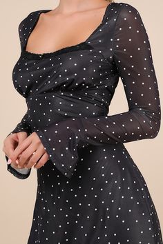 You'll be the biggest catch of the season in the Lulus Especially Adored Black Polka Dot Long Sleeve Mini Dress! A classic white polka dot print adorns stretchy mesh as it shapes a square neckline with lacy trim and a rosette detail, all framed by long sleeves with elastic at the shoulders and flared cuffs. Fitted bodice boasts an empire waist that continues into a figure-skimming A-line skirt with a mini hem. A top loop-button closure secures atop a keyhole cutout at the back. Hidden back zipper/clasp. Fit: This garment fits true to size. Length: Mid-thigh. Size medium measures 32.25" from shoulder to hem. Bust: Great for any cup size. Waist: Fitted - stretchy fabric allows custom fit. Hip: Not Fitted - fuller skirt allows room for hips. Undergarments: May be worn with a strapless bra, ad Dress With Lace Trim, Mini Dress Long Sleeve, Mesh Mini Dress, Long Sleeve Mini, Polka Dot Print, Black Polka Dot, Dot Print, Long Sleeve Mini Dress, Full Skirt