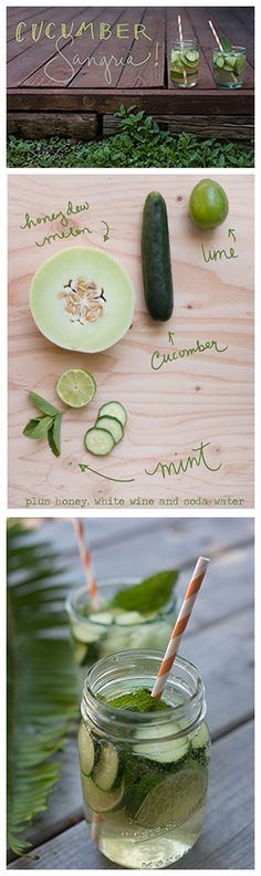 cucumbers and lemons in jars on a wooden table next to a sign