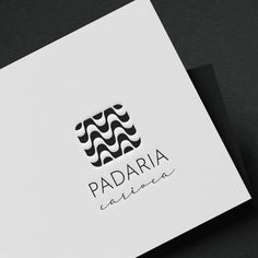 the logo for an italian restaurant called padaria carina is displayed on a black and white background