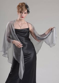 "100% silk iridescent chiffon shawl Color: #151 Silver Grey Width from tip to tip - 64\" Length to point of widest part - 30\" Care Instructions: hand wash cool, hang up to dry, iron with No Steam! Before you will make your order you can purchase a swatches to view and touch a real material.  - https://www.etsy.com/listing/110137147/swatches-set - https://www.etsy.com/listing/183186969/swatches-of-iridescent-chiffon-one-of-35 PROCESSING TIME: Since all of my items are custom made, average manufa Wedding Shawls, Silk Chiffon Scarves, Chiffon Shawl, Light Silk, Wedding Shawl, Wrap Shawl, Gray Silk, Chiffon Scarf, Natural Silk