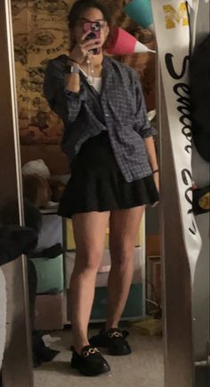 Summer Outfits With Skirts Casual, Grunge Tennis Skirt Outfit, Pleaded Skirt Outfits Aesthetic Black, Black Shirt Skirt Outfit, Tennis Skirt Outfit Night Out, Medium Black Skirt Outfit, Black Mini Tennis Skirt Outfit, Short Black Flowy Skirt Outfit, Skirt With Flannel Outfit