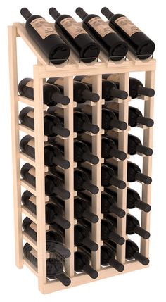 a wooden wine rack filled with lots of bottles on top of eachother in front of a white background