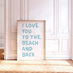 a white frame with the words i love you to the beach and back on it