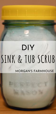 a mason jar with the words diy sink and tub scrub in it on top of a wooden table