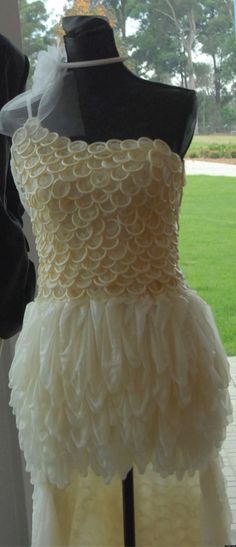 a dress on display in front of a window