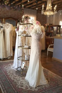 a display in a bridal shop filled with wedding gowns