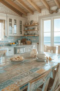 a kitchen table with plates and bowls on it