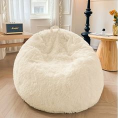 This plush and cozy fluffy bean bag chair cover is the perfect place to store all your favorite stuffed animals. Made of ultra soft faux fur, this fluffy storage bag feels luxurious to the touch. At over 3 feet wide, it's spacious enough to hold dozens of plush toys while looking cute and decorative in any room. The soft shaggy fabric is easy to clean for quick messes. And with no filler included, you can choose to keep it lightweight or add your own beans or pellets for extra slouch. Snuggle up Fluffy Bean Bag Chair, Soft Bean Bag, Fluffy Stuffed Animals, Room Wishlist, Faux Fur Bean Bag, Bean Bag Cover, Large Bean Bags, Bean Bag Chair Covers, Bean Bag Covers