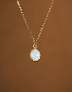 Moonstone necklace, June birthstone, minimalist everyday necklace, rainbow moonstone jewelry, blue flash, 14k gold filled chain A beautiful, one of a kind, oval shaped, faceted 7mm moonstone, lined in 14k gold vermeil, hanging from a 14k gold filled chain in the length of your choice. I took multiple photos in different light to show all the possible colors of this gem. Moonstones reflect at different angles and all sorts of light. Need a few reasons to love a moonstone other than for its beauty Rainbow Moonstone Jewelry, Necklace Minimalist, Everyday Necklace, June Birthstone, Gold Line, Moonstone Necklace, Moonstone Jewelry, June Birth Stone, Gold Filled Chain