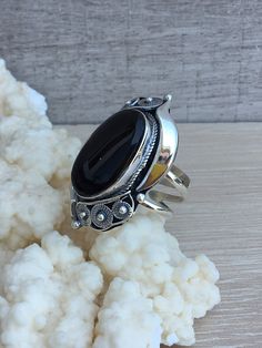 Silver ring with black onyx stone for women in technique filigree. Filigree work is very popular and never goes out of fashion. The black stone onyx gives this ring much more effectivity and uniqueness. If you are looking for something original, unique, and modern, you are in the right place! Our designer, owner, and jewelry maker Vartan Shahinian, who is also an Armenian FOLK art master, care you get the best quality, beautiful and unique work. Don`t forget to favorite our Etsy shop to get ever Ornate Black Sterling Silver Rings, Black Filigree Ring Jewelry, Black Ring With Intricate Design, Black Filigree Ring, Unique Black Sterling Silver Engraved Ring, Ornate Black Oval Ring, Black Sterling Silver Filigree Ring As A Gift, Black Oval Filigree Ring For Formal Occasions, Black Oval Ring With Intricate Design