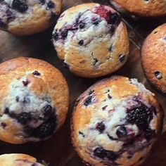 some blueberry muffins are sitting on a table