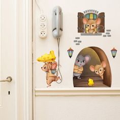 a door with some stickers on the front and side of it, depicting mice