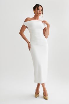 Fit perfection. Drop the neckline (and all pretenses) with the ALAYNA Recycled Nylon Midi Dress, a bodycon dress designed to be your perfect plus one to almost any event. We designed this in a soft supportive double layer fabrication and incorporated ruching to create an ultra flattering fit. Step into the sci-fi spirit of the season by pairing it with our silver Kailani Platform Heels.