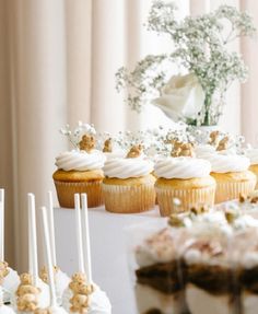 cupcakes and other desserts on a table