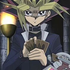 an anime character holding money in his hand