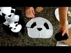 someone is making panda bear decorations out of toilet paper