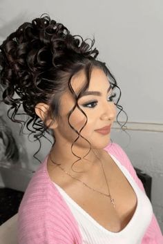 Curl Bun Hairstyles Wedding, Up Hairdos For Prom, Quince Bun Hairstyles With Flowers, Curly Hair Prom Styles Updo, Half Up Half Down Quince Hair With Crown, Quince Hairstyles Up, Quinceanera Updo Hairstyles, Quince Hairstyles With Crown Bun, Quince Hair Bun