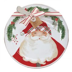 a christmas plate with a santa clause on it