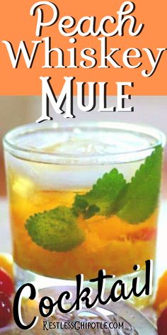 peach whiskey mule cocktail in a glass with mint garnish