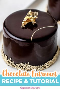 a chocolate cake with gold leaf decoration on top and the words chocolate internet recipe & video below