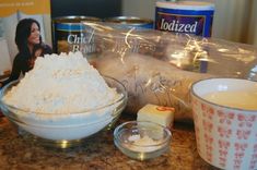 ingredients to make cake sitting on a counter top